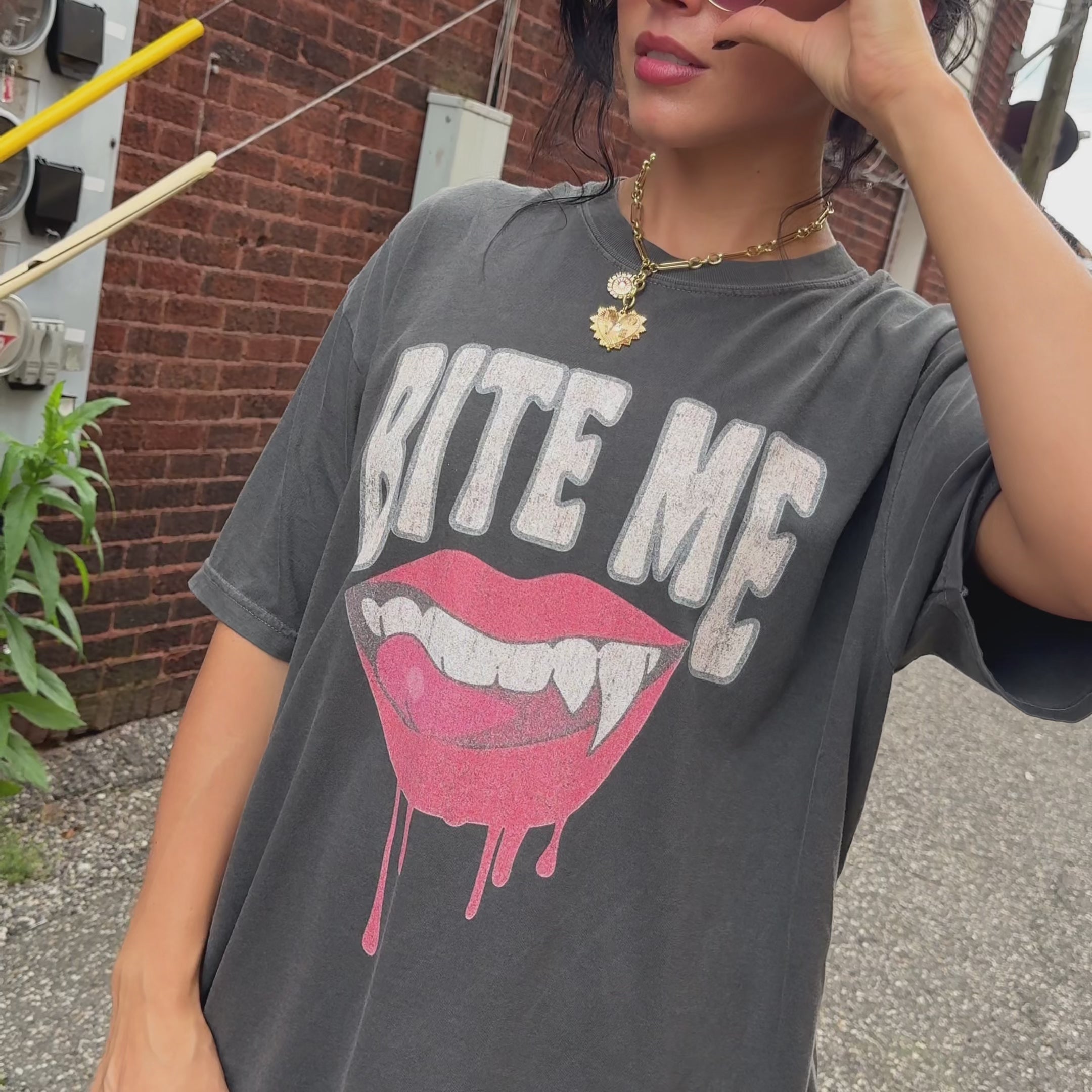 woman wearing bite me tee
