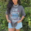 model wearing pursuit of happiness tee

