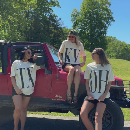 models wearing state initial tees