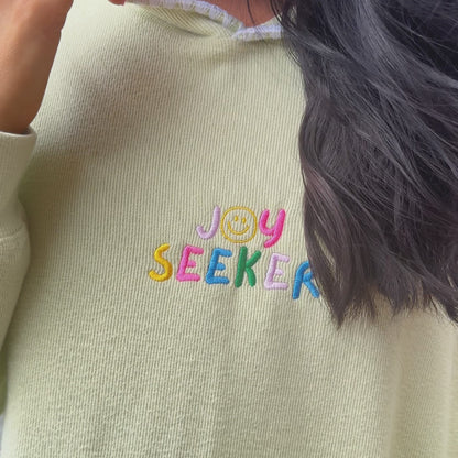 woman wearing Joy Seeker Embroidered Hooded Pullover