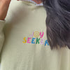 woman wearing Joy Seeker Embroidered Hooded Pullover