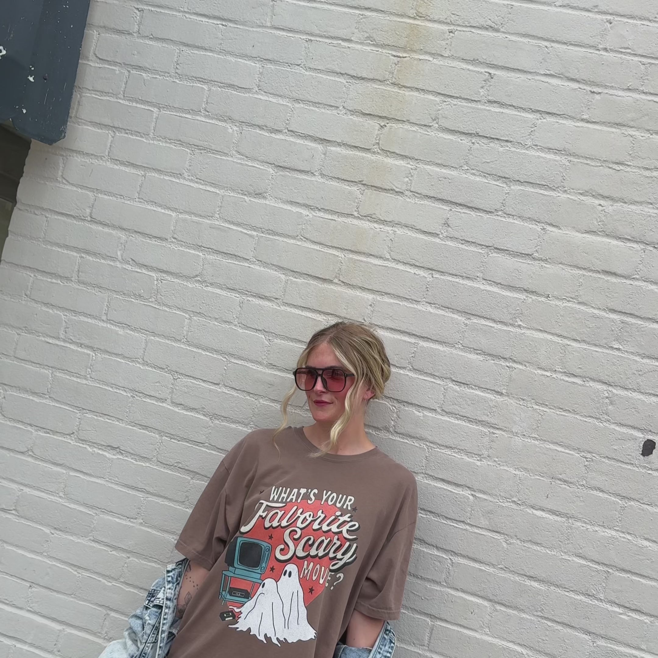woman wearing favorite scary movie tee