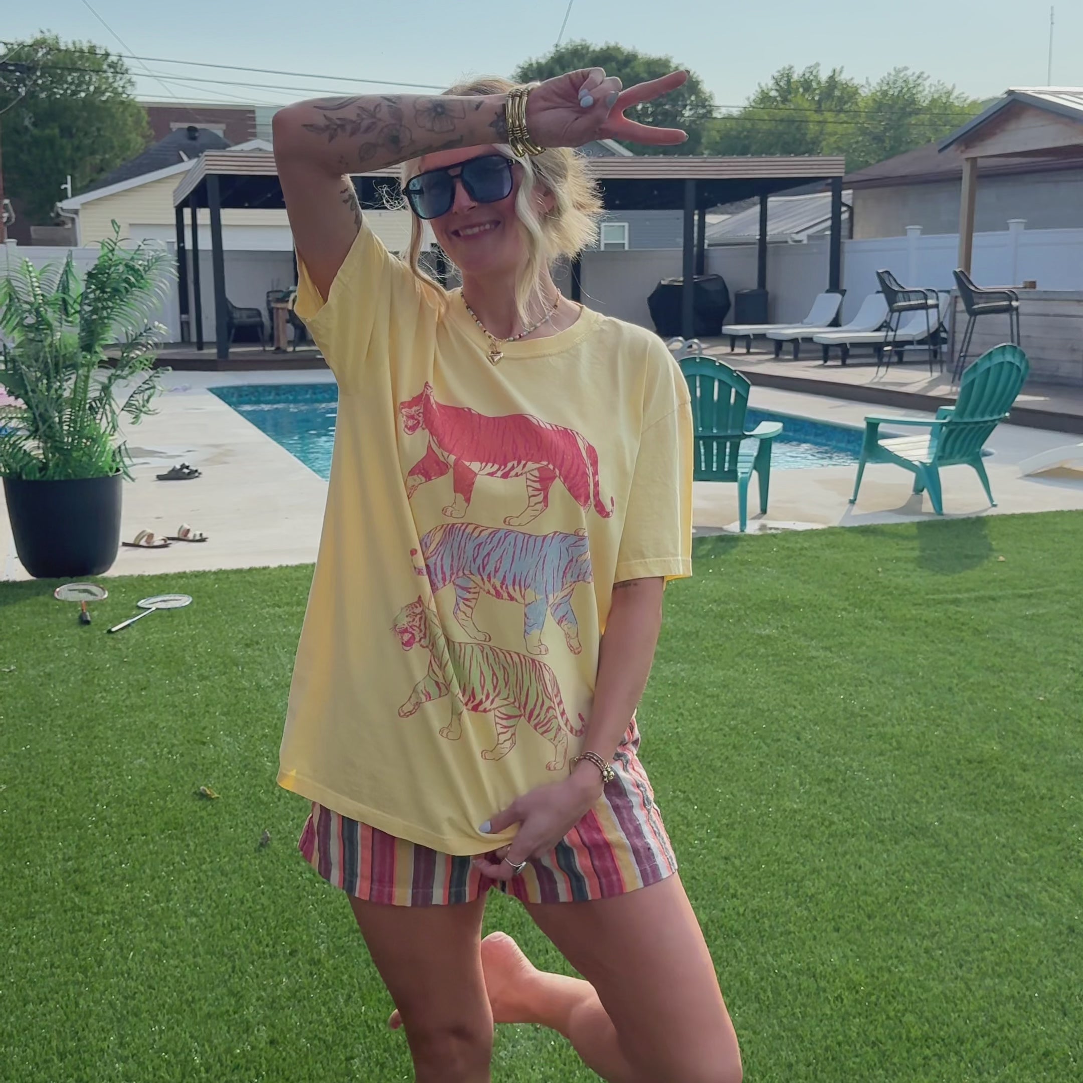 model wearing neon tigers tee